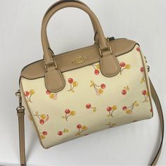 Brand: Coach Style: Bennett Mini Satchel (F31388) Size: Small Condition: New With Tags. No Flaws. Color: Cream /Multi-Color Measurements: 9in W X 6.5in H X 5in D Next Day Shipping Spring Coach Leather Shoulder Bag, Coach Leather Bags For Spring, Coach Rogue, Coach Satchel, Black Leather Satchel, Satchel Tote Bag, Bags Coach, Leather Satchel Bag, Satchel Tote