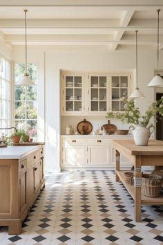 Modern farmhouse kitchen interior with lots of natural light, neutral cabinets and checkered tiled floor Neutral Country Kitchen, Painting Kitchen Sink, Kitchen Tile Floor Next To Hardwood, Italian Kitchen Aesthetic, Italian Villa Kitchen, Cream Kitchen Cabinet, Cabinet Kitchen Ideas, Italian Kitchen Ideas, Modern Italian Farmhouse