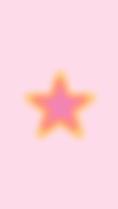 an orange and pink star on a pink background