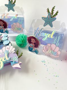 the little mermaid party favors are ready to be thrown into the ocean with their name on them