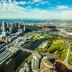 an aerial view of the city and river