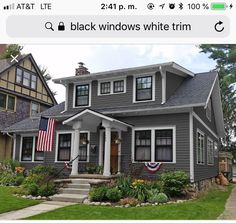 a house with an american flag on the front porch