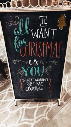 a chalkboard sign that says, i will want for christmas you just hoping to get me closer