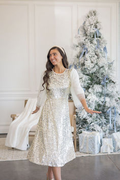 Stylish sequin dress for the holidays!

#modestfashion #modernmodesty #mididress #winterphotoshootdress #ladiesfashion #winterfashion #winteroutfitidea #modestwinterstyle #sizeinclusive #modestoutfitideas #outfitinspo #holidaydress #dressy #holidaystyle #churchdress #formal #modestworkwear #modestbridesmaiddress #modestwedding #christmasfamilyphotosoutfitidea #christmascardphotos #modestwinterformaldress #blacktieeventdress #christmasdress #winterdress #NYEdress