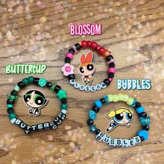 ✨Are you a fan of the Powerpuff girls?✨ Then look no further because these bracelets are perfect for you! Each bracelet is stretchy enough to fit an average sized wrist. However, if a bigger or smaller size is needed please let me know when placing your order!  ❗️DISCLAIMER: I own nothing but the patterns/designs of these bracelets. All other rights go to their respective owners. It is recommended you don't get these bracelets wet. Positive Bracelet Words, Trendy Black Plastic Bracelets, Customized Black Trendy Stretch Bracelet, Character Kandi Bracelets, Powerpuff Girls Bracelet, Character Bracelet Ideas, Powerpuff Bracelet, Baddie Bracelets, Matching Kandi Bracelets