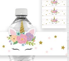 a water bottle with an unicorn's face and flowers on the top, surrounded by stars