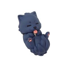 a blue cat figurine sitting on top of a white surface with its paws in the air