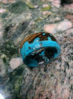 * Marbled Turquoise on Bocote Wood Ring Band. 3.5mm thickness. * 12 mm Wide. Any other your wide will be done by the Request. * Advice your Ring Size on the Note. Turquoise Inlay Round Rings, Blue Turquoise Ring With Inlay, Artisan Blue Rings With Patina, Blue Untreated Round Turquoise Ring, Unique Blue Patina Rings, Untreated Blue Turquoise Ring, Artisan Turquoise Ring With Chrysocolla, Turquoise Ring With Patina As Gift, Turquoise Patina Ring As A Gift