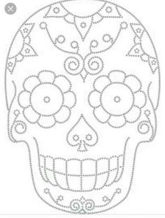 a drawing of a skull with flowers on it