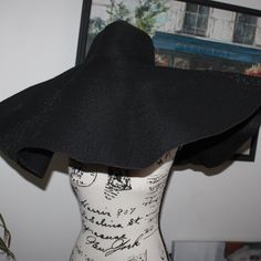 ( Seller Inventory # F-20-Po ) Women's Extra Wide Brim Hat Made Of A Very Tough Nice Material - The Edges Seem To Have A Little Wire In Them So You Can Mold And Shape This Hat. This Comes From A Local Boutique That Shut Down. This Item Is Brand New From The Shop - But No Tags On The Hat. Please See Measurements In The Photos. The Head Opening Is About 7-1/2" Across, And The Hat Comes Out About 12" From The Base! It Is Extra Wide For Sure! Very Large Hat! Black Summer Hat, One Size, Black Hats For Spring, Black Vacation Hat, One Size, Black Vacation Hat One Size, Black Hat One Size For Spring, Black Vacation Hat, Black One-size Sun Hat For Spring, Fitted Black Straw Hat For Summer, Black Fitted Straw Hat For Summer