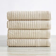 PRICES MAY VARY. Affordable Bundle: 4-pack Hand Towels (30 inch x 16 inch) QUICK-DRY, TEXTURED, AND PLUSH: Our Rori ribbed bath towels are designed to absorb more liquid than ordinary towels, and they dry quickly and completely. SUPER SOFT: These cotton bath towels feel super soft against your skin. Plus, they add an interesting ribbed texture and modern look to your bathroom. EASY CARE: Machine washable and long-lasting. Once washed, these towels fluff right back up. OEKO-TEX Standard 100 certi Cream Bathroom, Best Bath Towels, College Room, Bath Towels Luxury, Quick Dry Towel, Cotton Hand Towels, Cotton Bath Towels, Terry Towel, Bath Towel Sets