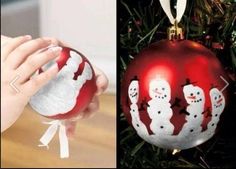 two pictures one is red and the other has white snowmen on it, hanging from a christmas tree