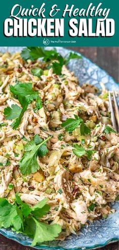 chicken salad with cilantro and parsley on a blue plate