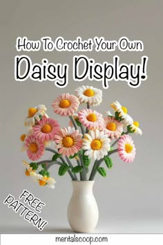 a white vase filled with daisies on top of a table next to the words how to crochet your own daisy display