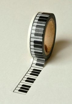 a roll of tape with piano keys on it