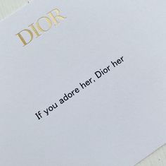 a close up of a piece of paper with the words dior written on it