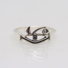 Sterling Silver Eye of Horus Ring...Marked 925...Total of weights 1.4grams... Size 8...Measure of Face 8MM...It's in very good condition. Symbolic Sterling Silver Rings Stamped 925, Symbolic Silver Sterling Midi Rings, Symbolic Silver Midi Rings In Sterling Silver, Silver Symbolic Midi Rings In Sterling Silver, Seed Pearl Ring, Amethyst Studs, Silver Eye, Eye Of Horus, Lovely Ring