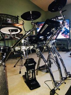 a drum set sitting on top of a carpeted floor