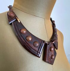 "Very vintage and quite unusual bakelite necklace. Etched brown plastic pieces arranged to imitate a necktie. The chain is also bakelite links. Art deco styling. A true statement piece. Very good vintage condition Measurements: total length: 15\"Center is 7\" longest center piece is 2\"" Bakelite Necklace, Old Hollywood Movie, Choker Collar Necklace, Choker Collar, Collar Necklace, Vintage Tees, Unique Necklaces, Neck Tie, Vintage Art