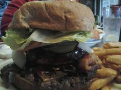 a hamburger and french fries on a plate