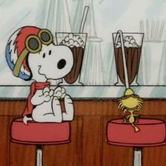 a cartoon dog sitting on top of two stools in front of a bar filled with drinks