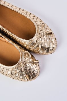 Ballet flats are back and we’ve given the classic design a little glow up. Stand out in our dressy Gia Woven Ballet Flat. Crafted from metallic woven leather in Gold, this flat features cute gold tipping on the bow. A comfortable and chic style with plenty of give, don’t miss this glamorous design. Gold Slip-on Ballet Flats For Party, Gold Flats For Summer Parties, Gold Flats For Evening In Spring, Chic Gold Flats For Summer, Elegant Gold Ballet Flats For Formal Occasions, Gold Flats For Summer Evenings, Gold Summer Evening Flats, Gold Evening Flats For Summer, Gold Flats For Summer Formal Occasions