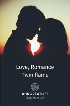 a couple kissing in front of the sun with love, romance and twin flame written on it