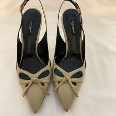 Dolce And Gabbana Sling Backs. Barely Worn. Made In Italy. Great Condition. Size 37 Luxury Cream Slingback Pumps With Pointed Toe, Luxury Cream Slingback Pumps For Summer, Luxury Beige Slingback Pumps For Evening, Beige Luxury Slingback Pumps For Evening, Luxury Cream Slingback Pumps With Heel Strap, Luxury Beige Slingback Pumps For Summer, Luxury Beige Slingback Pumps, Designer Beige Pointed Toe Slingback Pumps, Designer Beige Slingback Pumps With Pointed Toe