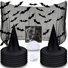 a bunch of black and white halloween decorations