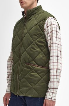 Layer up for cool and cold-weather adventures in this countryside-inspired vest textured with large-scale diamond quilting. Front zip closure Stand collar Front patch pockets Lined, with 100% polyester fill 90% polyester, 10% polyamide with 100% cotton contrast Machine wash, line dry Made in Vietnam Quilted Gilet, Man Quilt, Boss Orange, Quilted Vest, Halloween Accessories, Diamond Quilt, Dog Coats, Dog Care, Padded Jacket