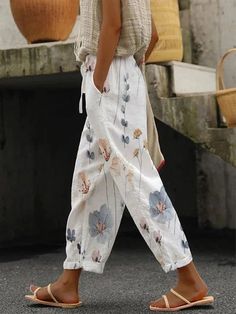 Casual Floral Lace-Up Loose Pants Baggy Floral Print Trousers, Casual Baggy Floral Print Pants, Spring Casual Harem Pants, Baggy Ankle-length Summer Bottoms, Baggy Ankle-length Summer Pants, White Ankle-length Harem Pants, Baggy Wide Leg Floral Print Pants, Spring Casual White Harem Pants, White Harem Pants With Pockets For Spring