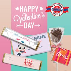 valentine's day chocolates and candy bars are on display in front of a colorful background