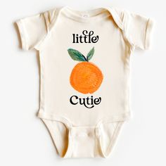 Little Cutie bodysuit, Retro Orange Bodysuit, Cute Fruit bodysuit. **HOW TO ORDER** 1. Select the color and size/name from the drop-down menu and add it to the cart 2. Repeat the process if you want to order more shirts **SIZE CHART** Please scroll through the listing photos to see the size charts. **DESIGN SPECIFICS** We print our shirts using Direct To Garment printing technology. process which makes the design naturally blend into the fabric, making it very soft to touch. **SHIRTS** white and natural are 100% cotton **PROCESSING TIME** Made to Order Please allow 1-5 business days for your order to be completed.PLUS SHIPPING TIME! **SHIPPING TIME** Depends on the shipping method chosen and destination, but in general after the order is placed, the package will arrive within 6 business da Cute Spring Cotton Bodysuit, Fitted Short Sleeve Bodysuit With Graphic Print, Fitted Graphic Print Short Sleeve Bodysuit, Cute Short Sleeve Bodysuit For Summer, Summer Cotton Bodysuit With Graphic Print, Cute Fitted Short Sleeve Bodysuit For Summer, Spring Cotton Onesie With Graphic Print, Summer Cotton Short Sleeve Bodysuit With Graphic Print, Fitted Cotton Short Sleeve Bodysuit With Graphic Print