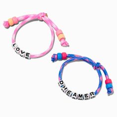 THEME x Claire's ''Love'' & ''Dreamer'' Glow in the Dark Adjustable Bracelets - 2 Pack Trendy Luminous Jewelry For Gifts, Luminous Adjustable Bracelets As Gifts, Trendy Neon Jewelry, Adjustable Neon Jewelry For Friendship, Adjustable Neon Friendship Bracelets As Gift, Trendy Hypoallergenic Pink Friendship Bracelets, Trendy Neon Bracelets As Gift, Trendy Neon Beaded Bracelets For Gifts, Trendy Neon Bracelets For Gifts