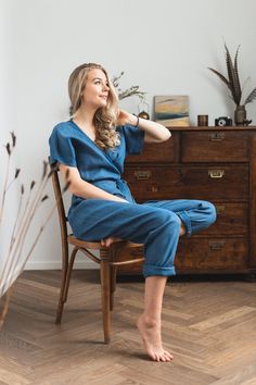 Linen Wrap Jumpsuit, Bohemian Clothing, Linen One Piece D E S C R I P T I O N - Wrap-style jumper for a comfortable fit - Elegant V-shaped neckline - Kimono sleeves (short) - Attached tie at waist, gentle pleats at the waist - Deep side pockets - Tapered leg D E T A I L S - Name: AMSTERDAM - Sizes: XS - XXL - Color: Mustard, Dusty peach, Salmon, Terracotta, Burgundy red, Cacao, Pine green, Chartreuse green, Milky white, Dusty Lavender, Light Grey, Mint, Sky blue, Blue, Deep blue, Striped grey, G Blue Relaxed Fit Jumpsuits And Rompers For Beach, Blue V-neck Relaxed Fit Jumpsuits And Rompers, Blue V-neck Relaxed Fit Jumpsuit, Linen One Piece, Capri Jumpsuit, Peach Salmon, Dusty Peach, Green Chartreuse, Dusty Lavender