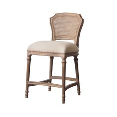 an upholstered bar stool with a white cushion