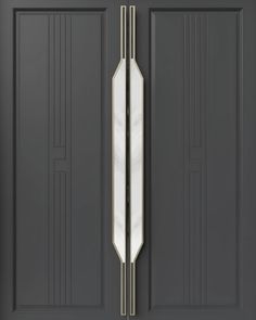 the front door is painted dark gray and has an art deco glass paneled design