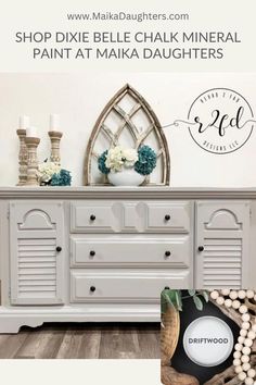 an old dresser is painted white and has flowers on it with the words shop dixie belle chalk mineral paint at maka daughters