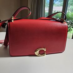 Previous Buyer Changed Their Mind. Never Used, Minor Scratch. Hate To See It Go But I Never Reach For It. Red Coach Shoulder Bag With Branded Hardware, Coach Red Shoulder Bag With Branded Hardware, Coach Parker, Coach Crossbody Purse, Bags Coach, Brown Crossbody, Coach Crossbody, Coach Crossbody Bag, Black Crossbody