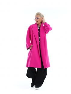 It's time to go bold! Our magenta coat has a flattering oversized silhouette that's easy to style with casual looks, as well as with elevated outfits. FEATURES:A relaxed magenta collar coat with functional pockets. Please note that this piece has no lining and no closures.100% Handmade product.SIZE & FIT:Fit: A relaxed fit with room to move.The model is wearing size Small or S/MMATERIALS & CARE:Content: PolyesterCare: Dry cleaning onlySHIPPING:Made to order, the processing time is 15 working daysThis item will be shipped via DHL Magenta Coat Outfit Winter, Long Length Maxi Coats For Womens Bright Pink, Magenta Coat, Oversized Pink Outerwear With Button Closure, Red Oversized Long Coat Outerwear, Collared Coat, Oversized Silhouette, Casual Looks, Relaxed Fit