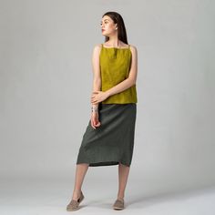 "Minimalist seasonless A-line linen skirt featuring an elasticated back waist for increased comfort and flattering fit and midi length which makes it easy to style with any top shape. Made of pure washed European linen for a perfectly soft feel and naturally wrinkled look. FIT The A-Line Skirt has a relaxed fit and sits slightly below the waistline. The intended positive ease around the hips is 8-12 cm/3.1-4.7\". To choose the right size, check out our body and garments measurements charts displ Summer Plain Relaxed Fit Skirt, Plain Summer Skirt, Versatile Relaxed Mini Skirt For Summer, Versatile Relaxed Summer Mini Skirt, Solid Summer Pencil Skirt, Summer Lined Pencil Skirt, Summer Solid Color Lined Pencil Skirt, Summer Lined Solid Color Pencil Skirt, Summer Lined Solid Pencil Skirt