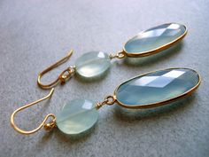 I found these gorgeous grey-blue chalcedony bezeled pieces surrounded by gold vermeil and stared them for a good while before seeing that they pick up the color in the aqua chalcedony coins beautifully. You will receive the exact pair pictured. They are nice and long- about 2.5 inches. 14k gold plated earwire.  Your earrings will arrive beautifully giftboxed. If you would like to upgrade to leverbacks please select the from the upgrade category on the lower left. Chalcedony Earrings, Set Jewelry, Aqua Chalcedony, Colorful Jewelry, Blue Chalcedony, Grey Blue, Charm Jewelry, Gold Vermeil, Gemstone Jewelry