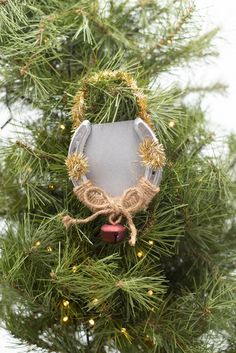 an ornament hanging from a christmas tree