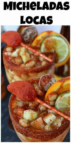 two glasses filled with drinks and garnished with lemons, limes, and other ingredients