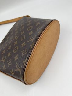 The Louis Vuitton Drouot bag is a fabulous crossbody style with an oval base. Made from the classic Louis Vuitton canvas. The Louis Vuitton monogram is a print that is carefully crafted from durable, brown canvas, Louis Vuitton's embossed, classic interwoven "LV" has remained the brand's signature since 1896. Louis Vuitton’sted canvas is one of the most durable materials in the game. Originally created for use on the brand’s travel trunks. The material’s durability shouldn’t come as much of a surprise, considering the travel trunks back in the day needed to withstand a lot of wear and tear. It’s not only resistant to scratches, but it is also water-resistant, so you can grab and go and not worry about babying your bag. This bag is in good vintage condition and comes with its original LV du Travel Trunk, Brown Canvas, Diaper Backpack, Back In The Day, Casual Backpack, Bag Tags, Womens Backpack, Bag Sale, Louis Vuitton Monogram