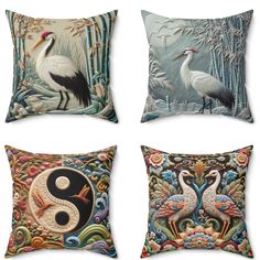 four decorative pillows with birds and yin signs on the front, two in the back