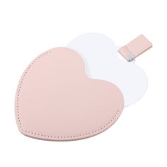 two pink heart shaped luggage tags on white background