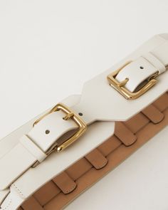 Details Elevate your looks with the Maxwell. This wide waist belt is made from smooth genuine leather and fasten with double brass buckles. Detailed with an intriciate woven leather strap, the Maxwell makes a statement. Style it to cinch the waist of blazers, outerwear, and dresses. Details: Waist Belt Adjustment: 3 holes on either side Strap Width: 3'' Genuine Leather Imported Sizing: X-Small: 27'' Small: 29'' Medium: 31'' Large: 33'' X-Large: 35'' Measurement is taken from the buckle point to the center hole. Dresses Details, Wide Waist Belt, Wide Waist, Brass Buckle, Suspenders, Waist Belt, And Dresses, Leather Belt, Leather Straps