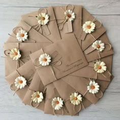 a bunch of brown paper with white flowers on it