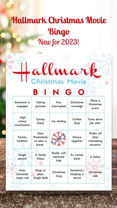 Hallmark Christmas Movie Bingo on white paper with red and blue snowflakes with a Christmas tree in the background and sitting on a brown table covered in snow Movie Watching Party, Engaged Pictures, Girls Night Movies, New For 2023, Night Movie, Hallmark Movie